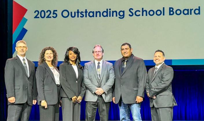 During the recent Texas Association of School Administrators (TASA)/Texas Association of School Boards (TASB) Convention in Houston, the Memphis Independent School District Board of Trustees accepted recognition as a Top Five Finalist for Texas School Board of the Year. From left: Secretary Michael Morris, President Sarah Cook, Vice President Charolette Maddox, Superintendent William Alexander, Val Gonzalez and John Robison. Not pictured: Josh Brooks and Joey Salinas.