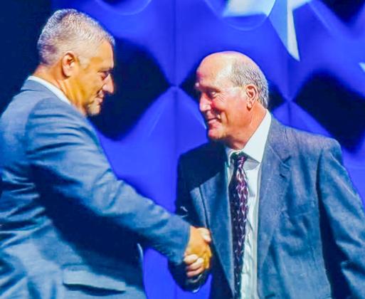 Wellington Independent School District Superintendent Kurt Ashmore accepts congratulations for Top Five Finalist for Texas Superintendent of the Year at the Texas Association of School Administrators (TASA)/Texas Association of School Boards (TASB) joint conference Friday, Sept. 12 in Houston.