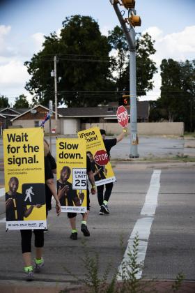 During the deadliest month of the year for pedestrians, the Texas Department of Transportation targets areas of high pedestrian activity and previously reported pedestrian crashes with street teams of “walking billboards,” which display key safety messages for drivers and pedestrians, Monday, Oct. 6 in Childress.