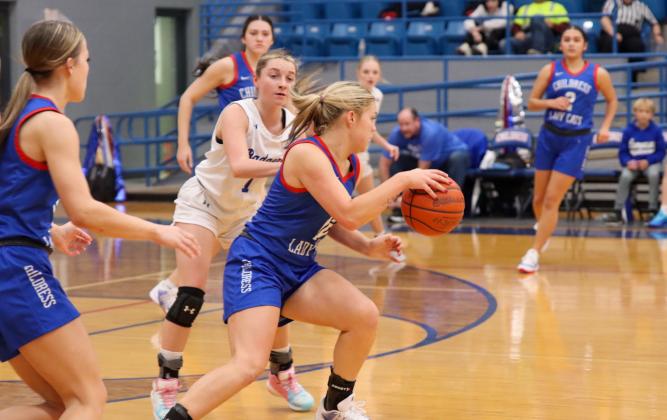 Childress’ Emma Jalomo, an All-Tournament Team selection, bypasses a Lampasas player during the 4th Annual Childress Rotary Holiday Invitational Thursday, Dec. 4-Saturday, Dec. 6 in the Bobcat Den.