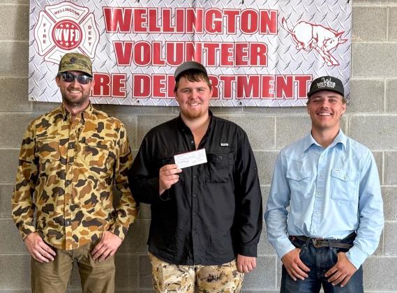 The Hot Shots, including, from left, Colby Henard, Hunter Stark, Dakota Marshall, took the Heaviest Hog at 273.3 lbs.