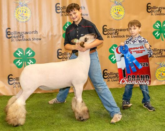 Baron Mitchell exhibits the Grand Champion Lamb, purchased by Salt Fork Logistics at the Premium Sale.