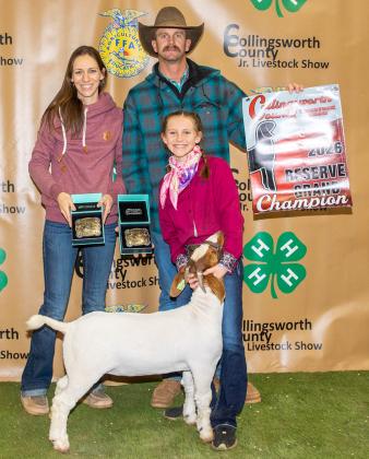 Raylie Sims exhibits the Reserve Champion Goat, purchased by Souder Farms at the Premium Sale.