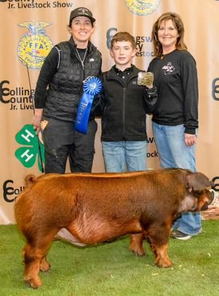 Maverick Orr shows the Breed Champion Dark Other Pure Breeds (DOPB) at the Saturday, Jan. 17 Collingsworth County Livestock Show, purchased by Ed Lagrone, Claude Crisp, Danny and Veronica Gray, Walser Farms/Sunglo Feeds at the Premium Sale.
