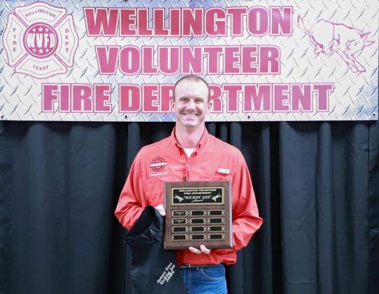 Sawyer Sims receives the Kicking Ass Award, as voted on by his Wellington Volunteer Fire Department colleagues.