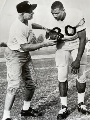 With the Southwest Conference not integrating until 1967, Junior Coffey was forced to leave the state to play college football, choosing the University of Washington.