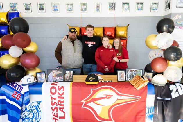 Childress High School senior Kavyn Geiser signs a National Letter of Intent to continue his baseball career with the Hesston College Larks Thursday, Jan. 29 in the Childress High School gymnasium foyer.