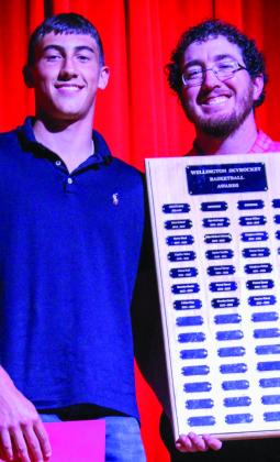 Wellington High School sophomore Callen Kane earns the Boys’ Basketball Offense Award, presented by Coach Quenton Patterson.