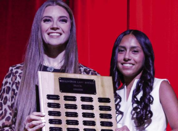 Sophomore Sabrina Segovia receives the Distance award for girls’ track, presented by Coach Courtney Head.