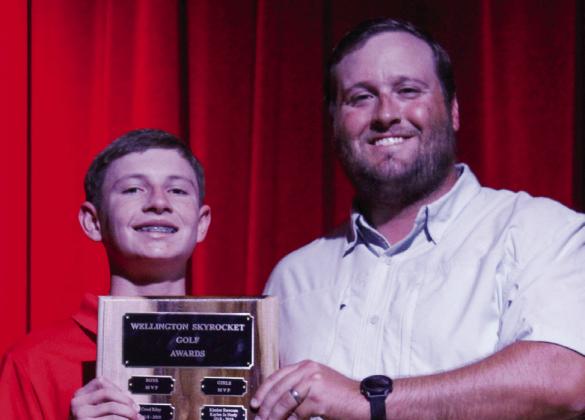 Freshman Carter Ouellette earns the Most Valuable Player honor for boys’ golf, presented by Coach Klark Ashmore.