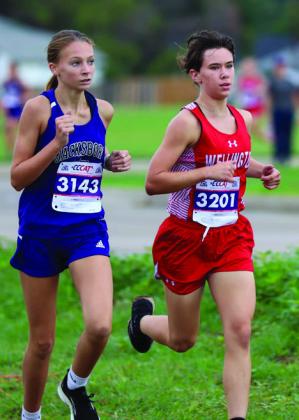 Wellington’s Addy Mock caps fifth place at the Burkburnett Cross Country Jamboree Thursday, Sept. 1, setting the Lady Rockets up for a reserve championship finish. For additional photos, see 4B. Photos by Elizabeth Gamboa