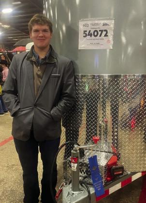 Childress High School Future Farmers of America (FFA) students, including Tuck Detwiler, compete in the San Antonio Stock Show’s Junior Agricultural Mechanics Show Friday, Feb. 21-Sunday, Feb. 23 in San Antonio. Showing a bumper-pull stock trailer, Detwiler received a blue ribbon, as. well as placed second in his division. Photos Courtesy of Childress FFA