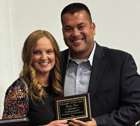 Educator of the Year Deidre Kane, Wellington Elementary School Principal, is awarded accolades by Wellington High School Principal Jermaine Cantu.