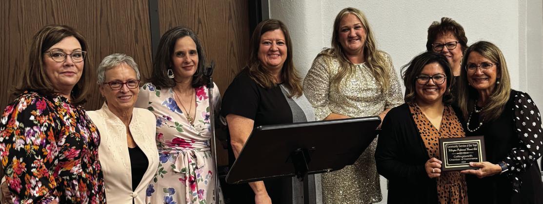 Collingsworth County Chamber of Commerce President Karen Caldwell, right, presents the Community Service Award to the Wellington Professional Women’s Club. From left: Treasurer Linda Duke, Pat Barnett, Secretary Karrie Hudson, Vice President Carrie Martinez, President Whitney Wiebe, Megan Rodriguez, Candy Powell, Caldwell.