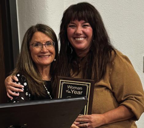 Woman of the Year Rachae Barlow, right, is awarded her honor by Collingsworth County Chamber of Commerce President Karen Caldwell. For a detailed description of the 2024 chamber honorees, see last week’s edition of “The Red River Sun.”