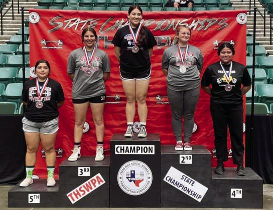 Memphis’ Emili Martinez medals a fourth-place finish at the Texas High School Women’s Powerlifting Association 1A-2A State Championships Wednesday, March 15 at the Comercia Center in Frisco. From left: Marceala Gonzalez, fifth place, Rocksprings; Harly Pence, third place, Cumby; Angelica Hernandez, first place, Hawley; Kadence Pettit, second place, Cumby; Martinez. Photos Courtesy of Memphis ISD