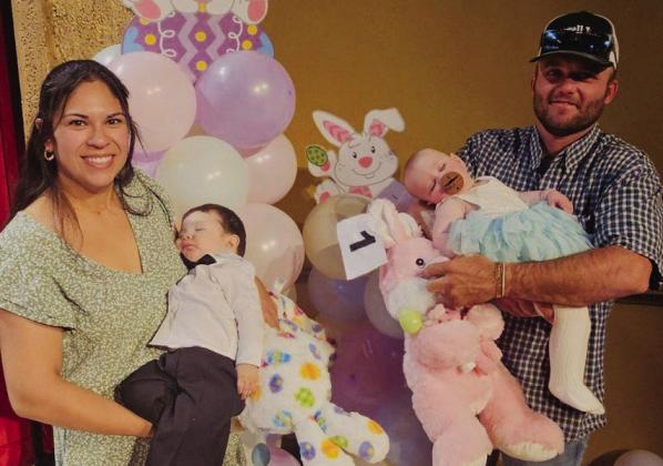 Eight-month-old Knox Storm Smith, son of Roxanne and Mason Smith, and 5-monthold Remington Charlene Renee James, daughter of Kristen and Kody James, serve as the 1-11-Month-Old winners in the Sunday, April 7 Tiny Tot Revue. Courtesy Photos