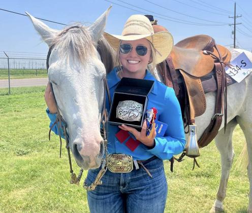 Memphis’ Chloie O’Neal receives Senior All-Around Stock Horse Champion at the recent 2023 District 1 4-H Horse Show at the Moore County Community Building and Rodeo Arena in Dumas. Courtesy Photos