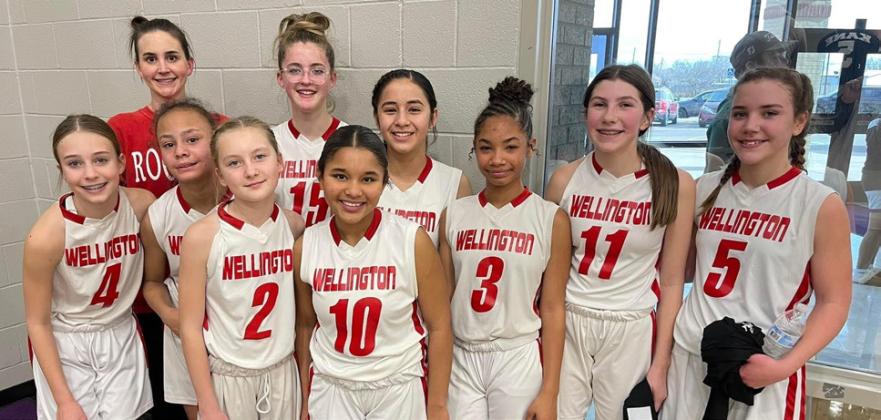 The seventh-grade Wellington Lady Firecrackers finish second in the Panhandle Tournament Saturday, Jan. 20, falling to Childress by a final score of 32-27. Front row, from left: Hartley Kane, Demi Massey, Jaylah Menefield, Anna Dwyer, Gannon Guy. Back row, from left: Libby Chandler, Coach Karen Fisher, Raelynn Castor, Autumn Shatswell, Hazel Estrada. Courtesy Photos