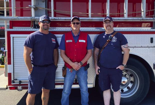 Childress Firefighters Justin Willis, left, and Justin Westmoreland, right, recently thank Tractor Supply Co. employee Randy Wadley, center, for a discount on a pump for Tanker No. 2. “Thank you, Tractor Supply and Randy Wadley for giving us a huge discount,” Childress Fire Department said. “We greatly appreciate it.” Photo Courtesy of Childress Fire Department