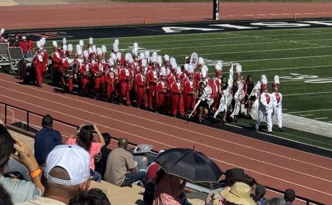 The Rocket Regiment enters the field for its performance at the UIL Region 1 Marching Contest Saturday, Oct. 18 at Dick Bivins Stadium in Amarillo, earning an overall Division 2 rating. See page 4B for additional photos. Wellington High School
