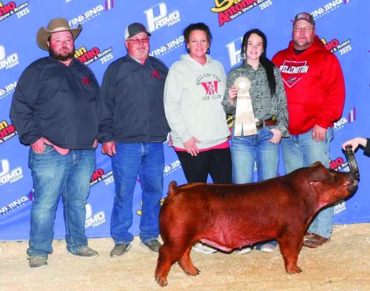 Wellington High School junior Kenady Skelton brings home a 10th place in the Duroc Barrow division of the recent San Antonio Stock Show &amp;amp; Rodeo. From left: Colby Newbrough, Dave Newbrough, Carrie Skelton, Kenady Skelton, Chad Skelton. Photo Courtesy of Collingsworth County Livestock Association