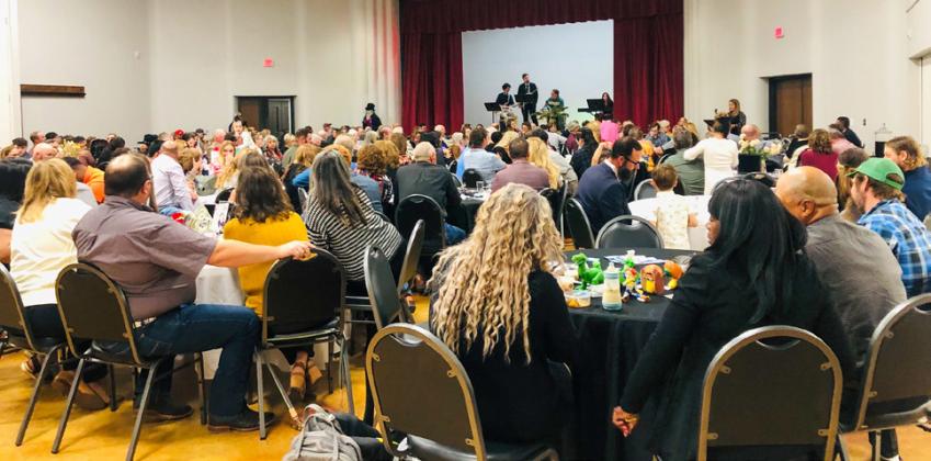 Mistress of Ceremonies Karen Caldwell welcomes guests to the 2024 Collingsworth County Chamber Awards Banquet as West Texas A&amp;amp;M University’s four-piece jazz ensemble, The New General Catalog, performs its final selection. The Red River Sun/Bev Odom