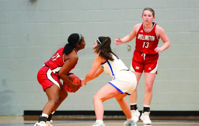 The Wellington Lady Rockets play the Childress Lady Cats on Tuesday, Nov. 15 in Childress. The varsity Lady Rockets fell to Childress 48-44 while the junior varsity Lady Rockets squeaked by with a 34-33 win. Photos by Shadin Zuber