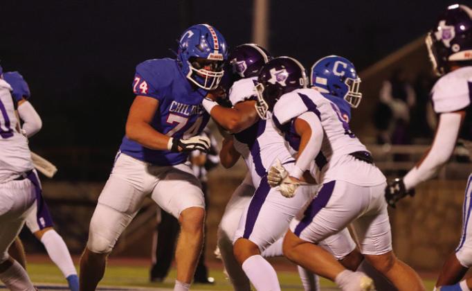 Childress’ Ethan Ferguson (74) holds back the Dimmitt Bobcats Friday, Oct. 27 at Fair Park Stadium.