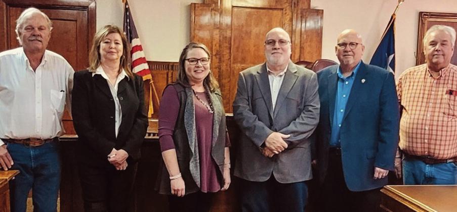 Collingsworth County Pct. 4 Commissioner Richard Johnson, left, County/District Clerk Jackie Johnson, Treasurer Gina Harris, County Judge Scot Martindale, Justice of the Peace Cliff Waller and Pct. 3 Commissioner Joel Sherwood recite their oath of office during a swearing-in ceremony at 2 p.m. Sunday, Jan. 1 in the Collingsworth County Courtroom. Courtesy Photos