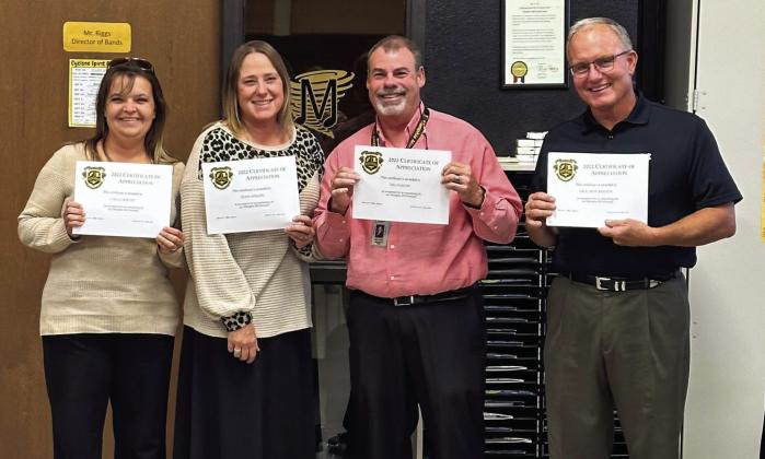 Rounding out the month of October, also known as National Principals’ Month, Travis Elementary Principal Carla Murphy, left, Austin Elementary Principal Trina Hardin, Memphis Middle School Principal Wes Hardin and Memphis High School Principal Richard Hutcherson accept certificates of appreciation. Photo Courtesy of Memphis ISD