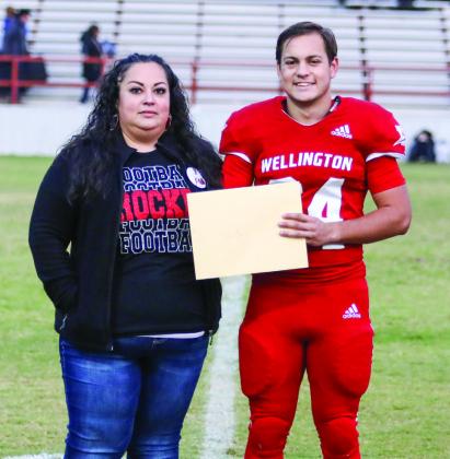 Prior to the final home football game, held Friday, Oct. 25, Wellington High School recognized seniors active in football, cheerleading and band. Eric Garcia is the son of Neomie Garcia and Patrick Garcia. He has played varsity football for the Rockets for two years.