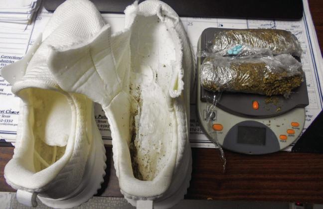 T.L. Roach Jr. Unit mailroom clerks discovered 76 grams of a green, leafy substance, believed to be K2, hidden in the soles of a pair of shoes, which was mailed to two inmates, Tuesday, Jan. 24. Photos Courtesy of the Texas Department of Criminal Justice