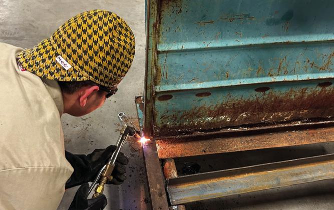 Memphis Independent School District (ISD) Career Training Center students recently repair a trailer for the public. Photos Courtesy of Memphis ISD