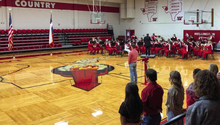 Following the Rocket Regiment’s performance of “America the Beautiful,” Student Council President Barret Phillips leads the Pledge of Allegiance. The Red River Sun/Bev Odom