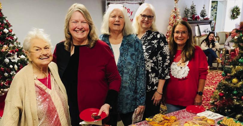 Collingsworth County Museum Director Karen Caldwell, right, welcomes visitors Melba Hinson, left, and sisters, Doris Peters Wall, Linda Peters Brotherton and Karon Peters Sain, to a Christmas Open House Friday, Dec. 20. Guests flowed into the Ellis Art Center from 10 a.m.-2 p.m. for the warm fellowship, finger foods and hot Wassail and coffee. The Red River Sun/Bev Odom