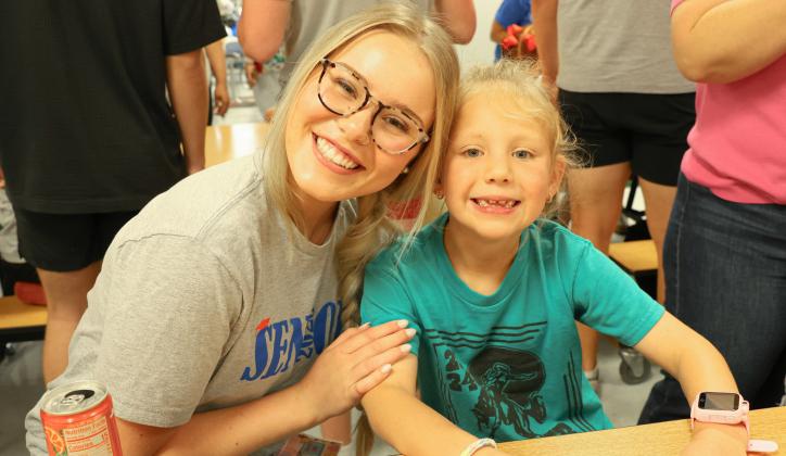 Kindergarteners, seniors team up for Kindergarten Signing Day