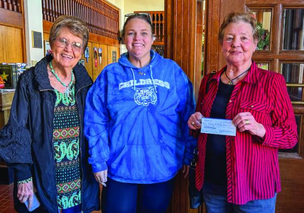 Modern Home Club makes a $50 donation to the Childress County Heritage Museum, thanking Childress County Heritage Museum Director Niki Seal, who accepted the donation, for use of the museum’s facilities for club meetings.