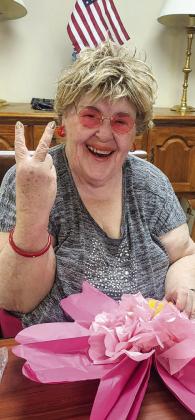 Memphis Convalescent Center residents create flowers for a to-be-announced upcoming “groovy” event. Photo Courtesy of Memphis Convalescent Center