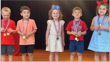 Megan Wischkaemper’s pre-kindergarten students accept awards as follows. From left: Ben Lemons, Perfect Attendance; Lincoln Mayer, Most Improved; Kollins Jones, American Citizenship; Damien Page, Most Improved, Perfect Attendance; Sherree Ballinger, American Citizenship. Courtesy Photos