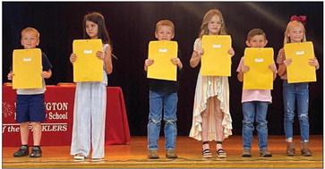 Lauren Patterson’s first graders accept A Honor Roll and American Citizenship awards as follows. From left: Jackson Smith, A Honor Roll; Alora Cantu, A Honor Roll; American Citizenship; Aaron Duke, A Honor Roll; Bentley Keys, A Honor Roll; Noah Peters, A Honor Roll; Perrie Reyna, A Honor Roll, American Citizenship.