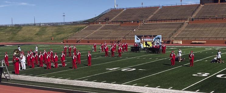 Under the leadership of senior Drum Majors Kali Brewer and Addy Mock, the 60-piece Rocket Regiment performs its 2023 show, “A Night at the Movies,” at the UIL Region 1 Marching Contest Saturday, Oct. 14 at Dick Bivins Stadium in Amarillo. “They earned straight 2s, but this young group has grown so much this year,” said Wellington High School Principal Jermaine Cantu. “We are proud of you.” Justin Mixon and Harley Warrick serve as directors. Courtesy Photo