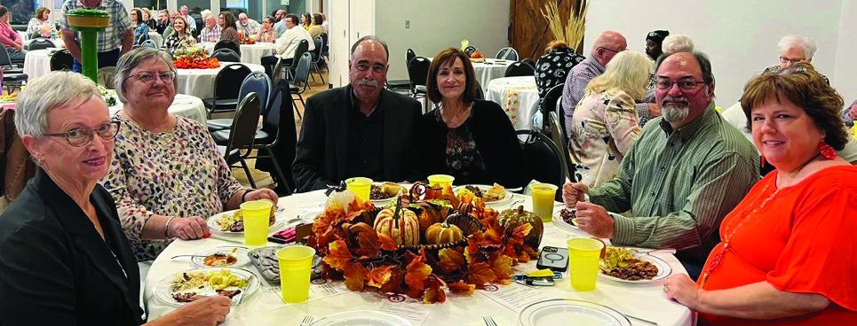 Local philanthropists Pat and Val White, center, visit with Pat Barnett, left, Cheryl Tarver and Jeff and Candy Powell during the Oct. 16 Collingsworth County Chamber Banquet. Courtesy Photo