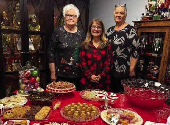 Collingsworth County Museum serves as a destination for the Hearts United Give Support (HUGS) 2025 Holiday Home Tour, offering refreshments and a place for fellowship. From left: HUGS volunteers Nancy Harris, Karen Caldwell and Debra Belew.