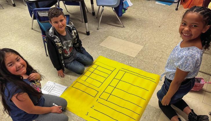 Austin Elementary School second-grade students create pictographs and bar graphs, using data they collected throughout the week. Students collaborated with their team to choose a topic, which they then used to survey their classmates. Using the survey results, students then turned the gathered information into graphs, which they used to quiz the other teams. Photos Courtesy of Memphis ISD
