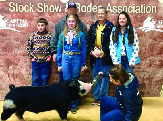 Memphis’ Baylee Altman competes in the San Angelo Stock Show and Rodeo barrow show.