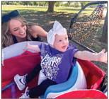Twenty-three-month-old Kaydence Faith Mixon brings so much joy to Wellington Professional Women’s Club (WPWC) Annual Bubble Run for Hearts United Give Support (HUGS) last Saturday, May 6 at Powell Park. Carly Carter Kay admires Mixon’s feisty spirit. Only a week earlier, Mixon rang the bell at Cook Children’s Hospital in Ft. Worth. Courtesy Photo