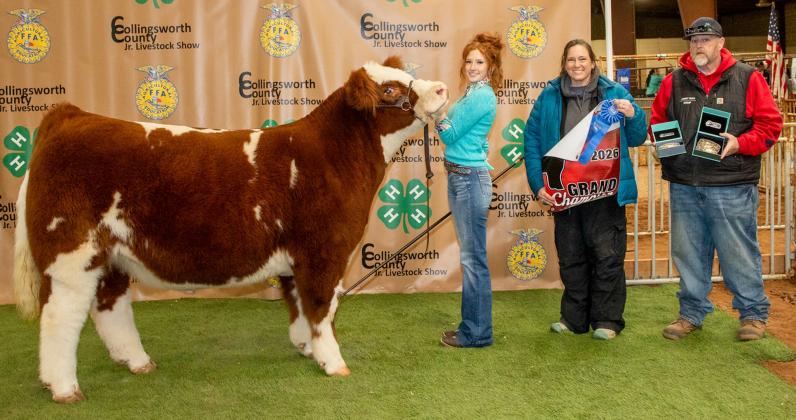 Bailey Page exhibits the Grand Champion Steer, purchased by Wellington State Bank and Buck Creek Ranch at the Premium Sale. Uplift Imaging