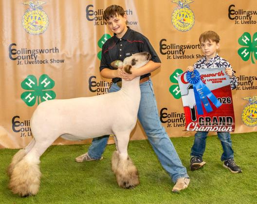 Baron Mitchell exhibits the Grand Champion Lamb, purchased by Salt Fork Logistics at the Premium Sale.