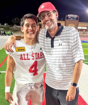 Wellington High School Class of 2026 graduate Noah Cantu assesses the 21st Annual ASCO All-Star Classic outcome with Wellington Independent School District Athletic Director and Head Football Coach Greg Proffitt following the Saturday evening, May 30 contest. WELLINGTON HIGH SCHOOL